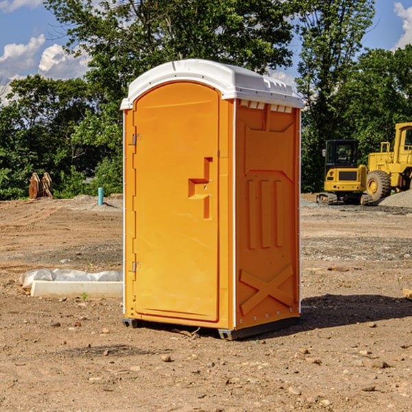 how often are the portable restrooms cleaned and serviced during a rental period in Monroe NH